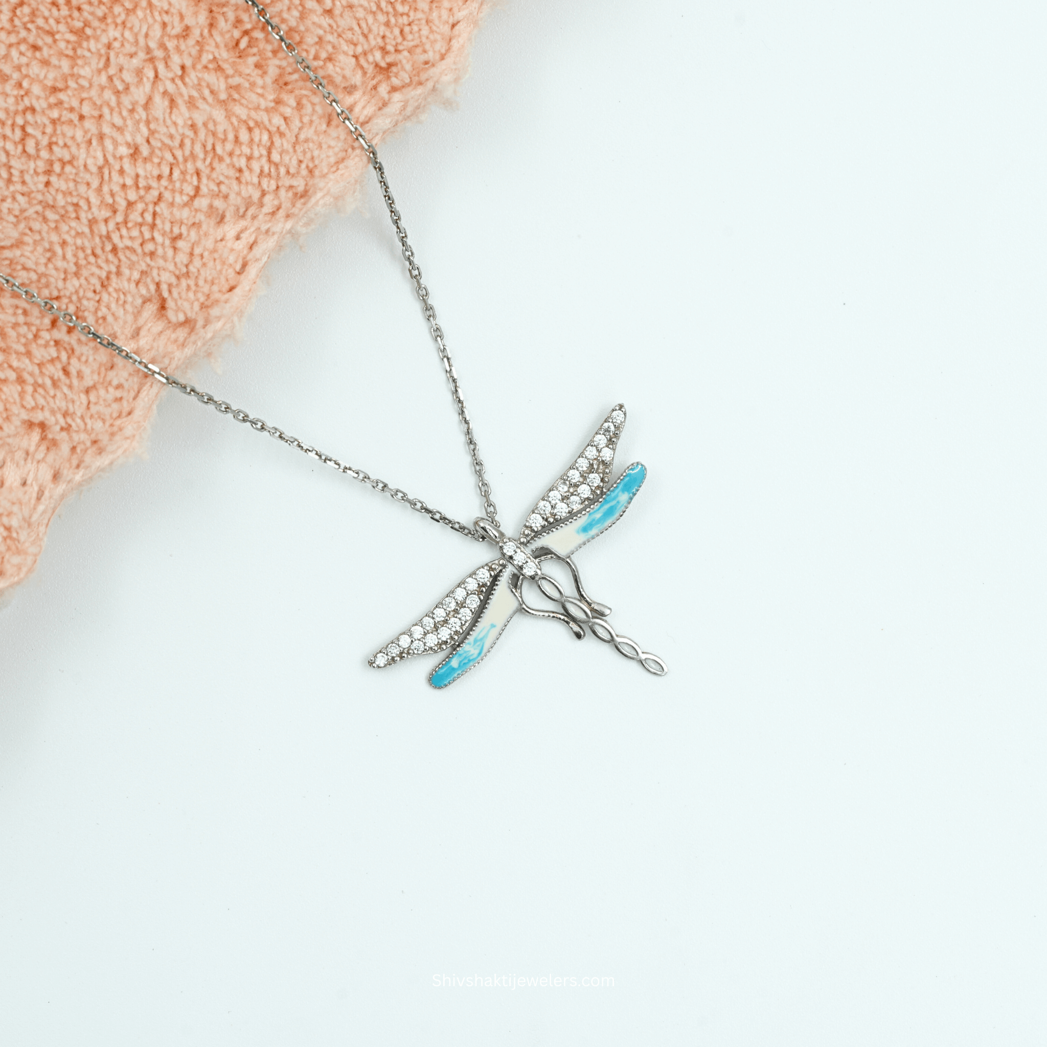 925 silver blue enamel dragonfly pendant necklace with cubic zirconia stones and delicate silver chain.