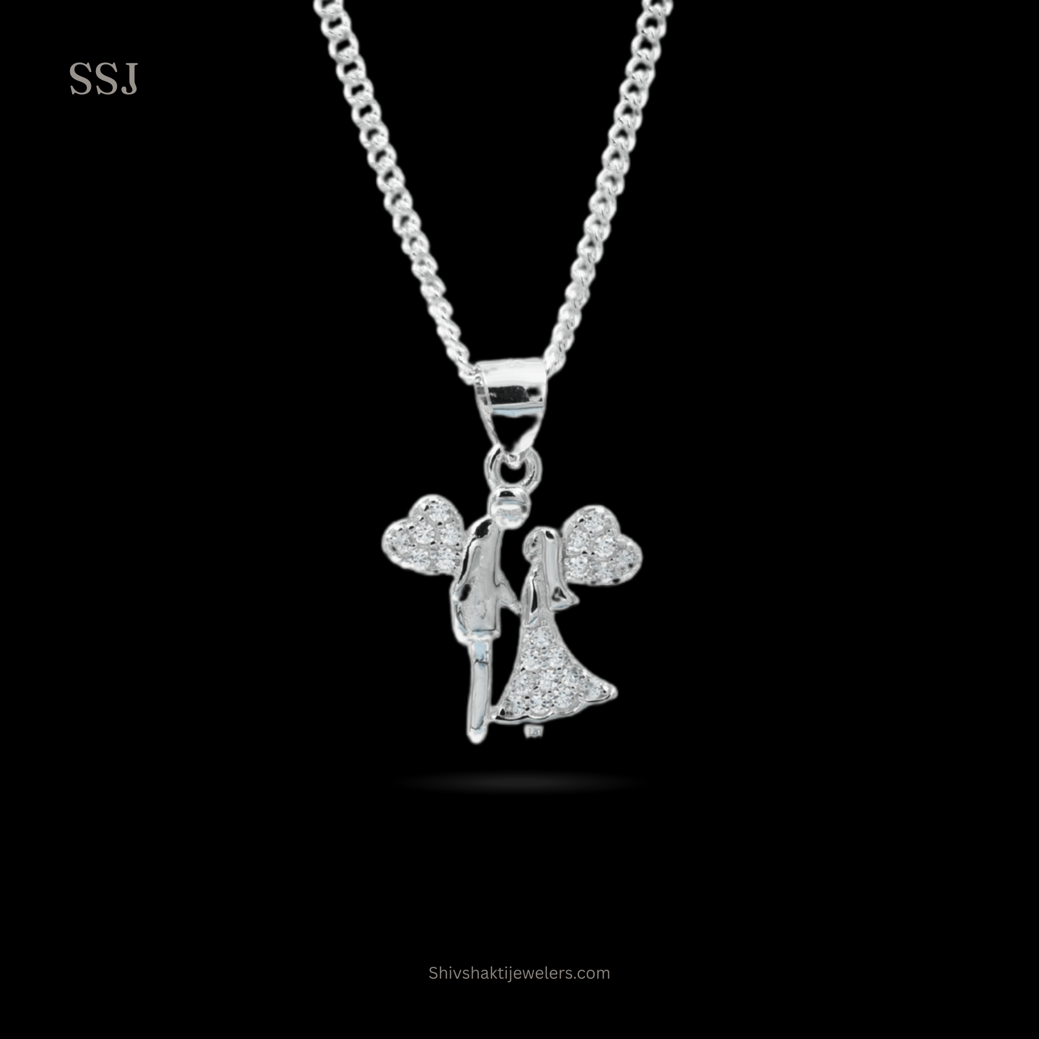 Silver necklace with a pendant of a couple on a black background