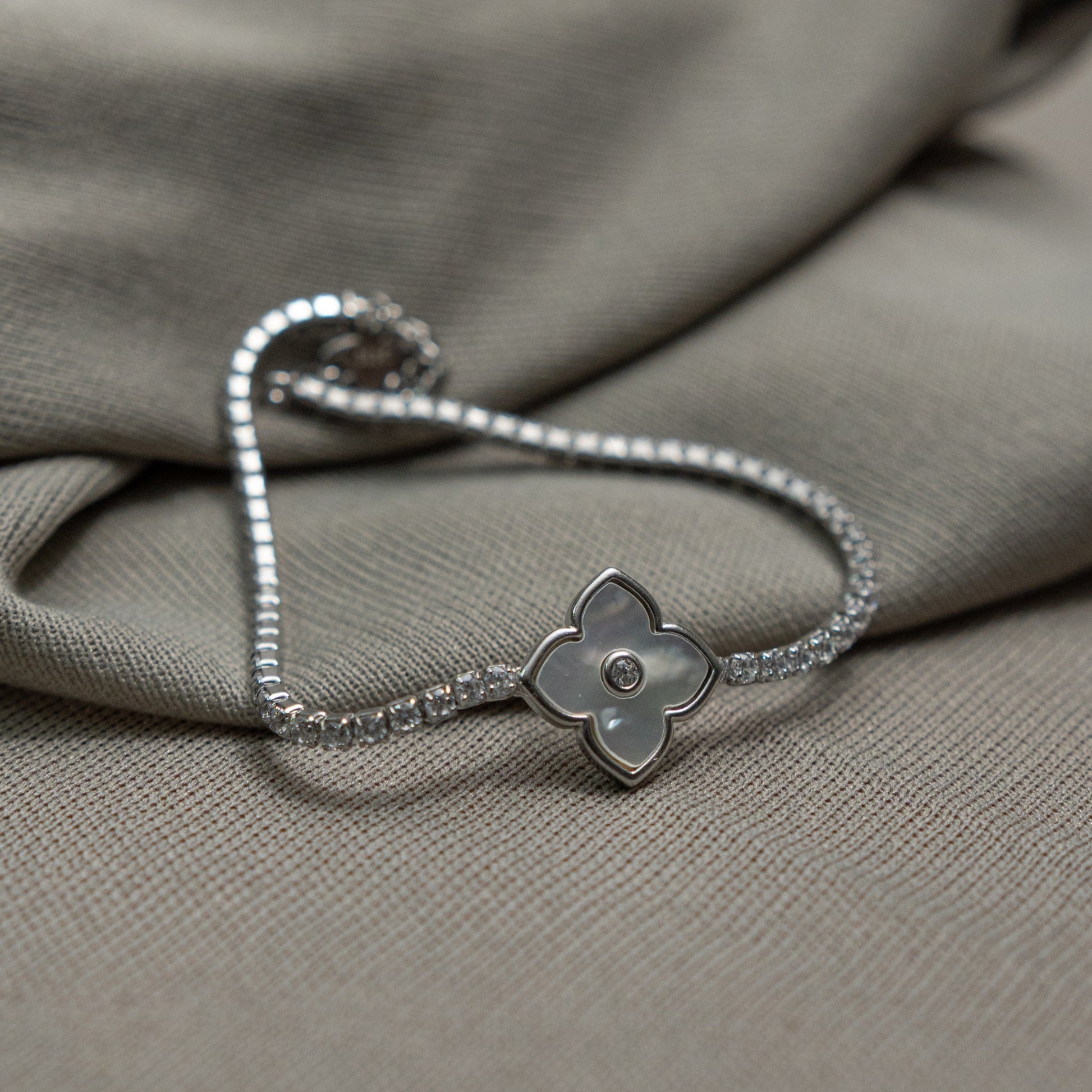 925 silver floral CZ bracelet with sparkling chain and flower charm
