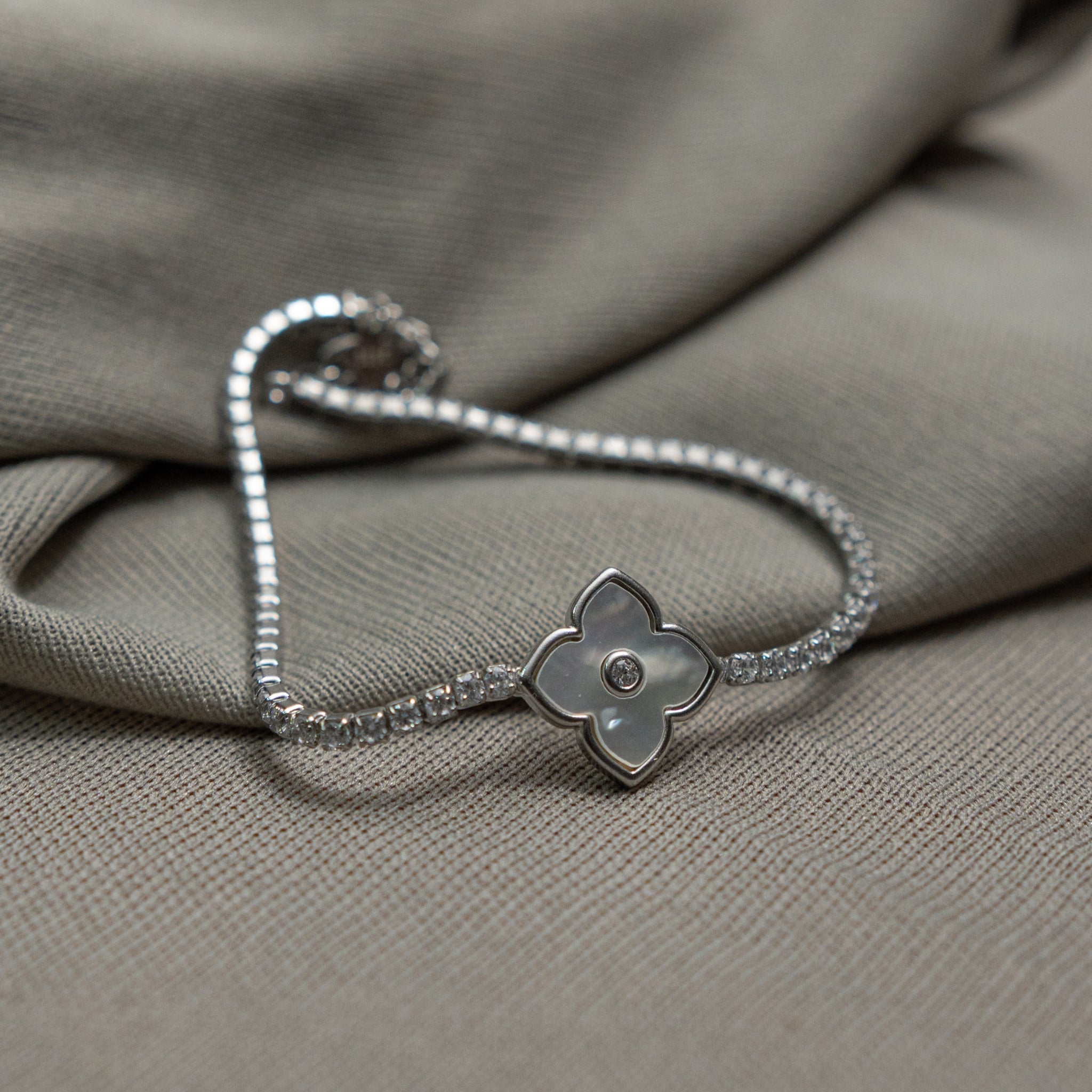 925 silver floral CZ bracelet with sparkling chain and flower charm
