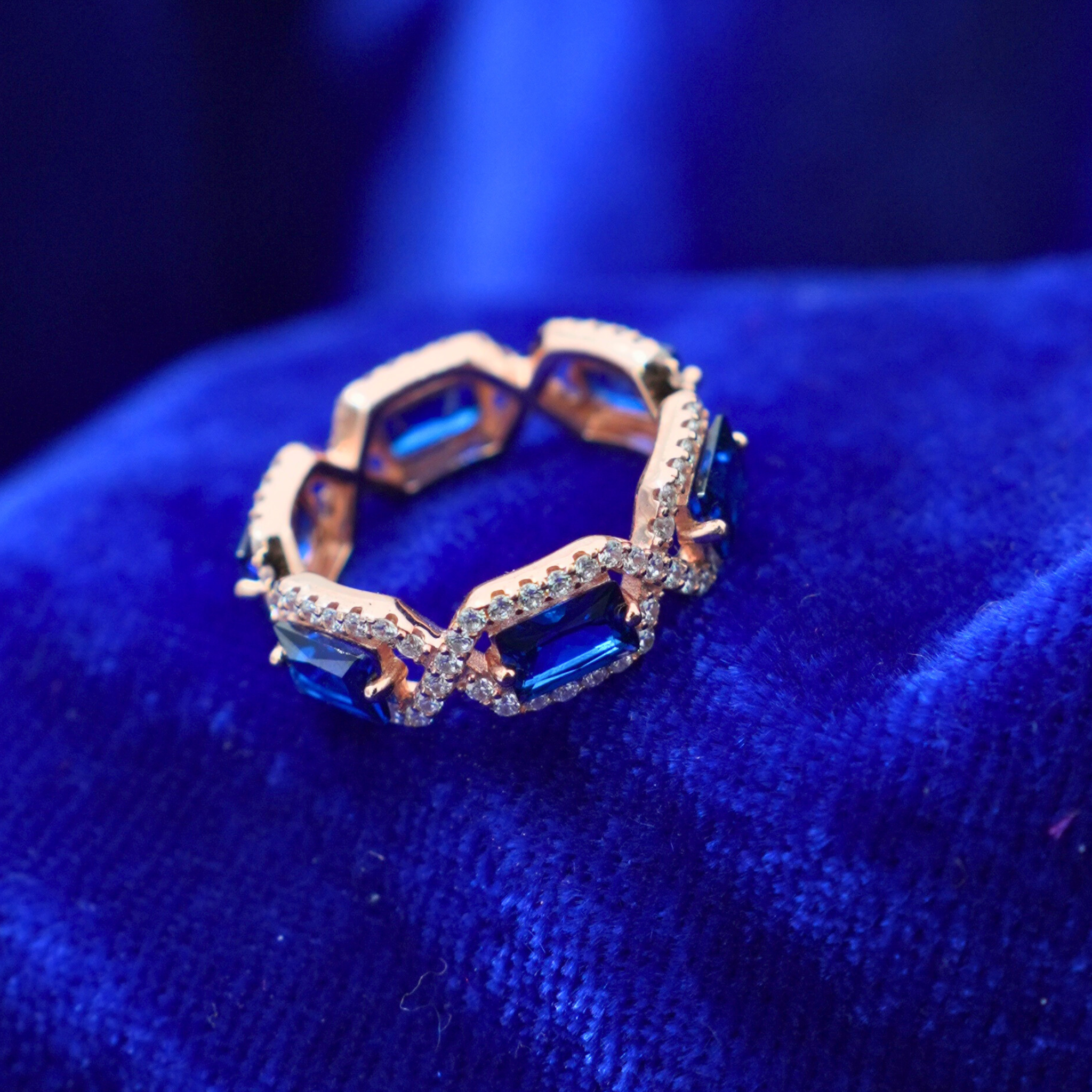 Rose Gold Plated Blue Stone Eternity Ring | Elegant Cocktail Style for Women