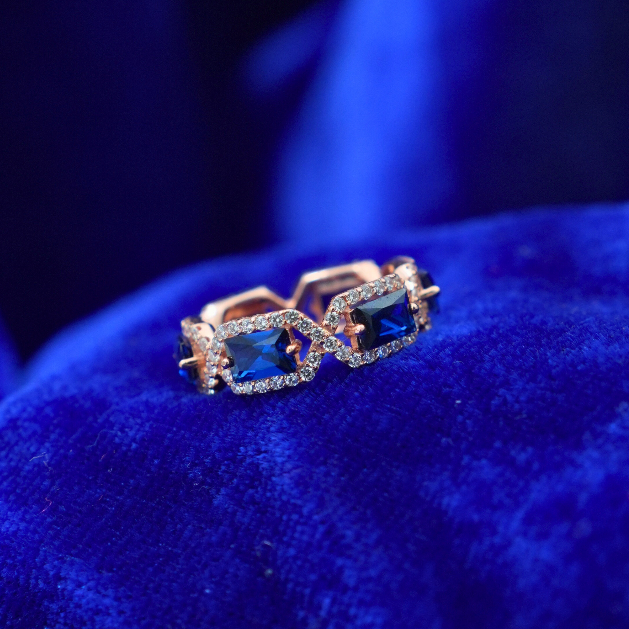 Rose Gold Plated Blue Stone Eternity Ring | Elegant Cocktail Style for Women