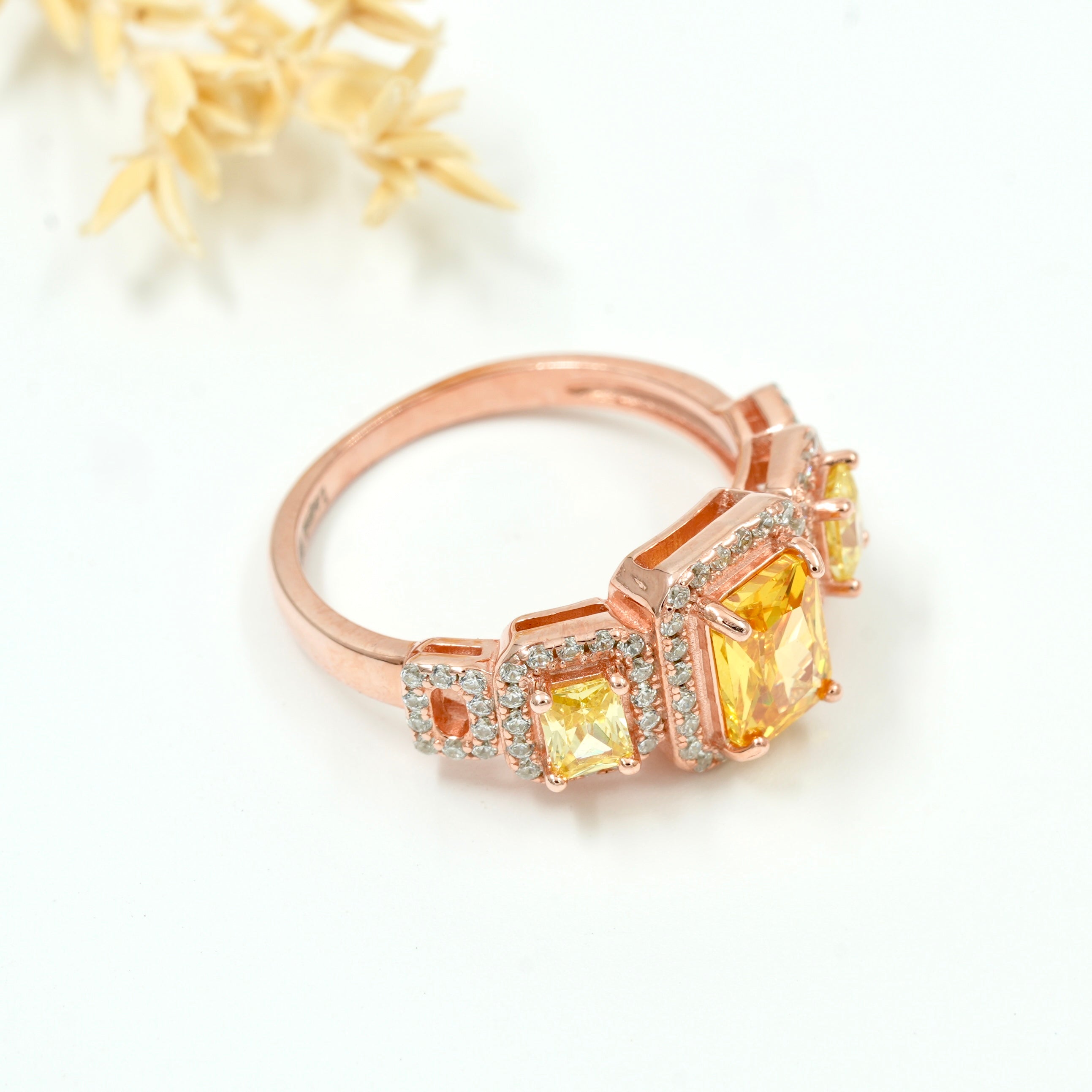 Rose Gold Plated 925 Silver Triple Stone Ring with American Diamond Halo – Available in Blue, Yellow & Peach