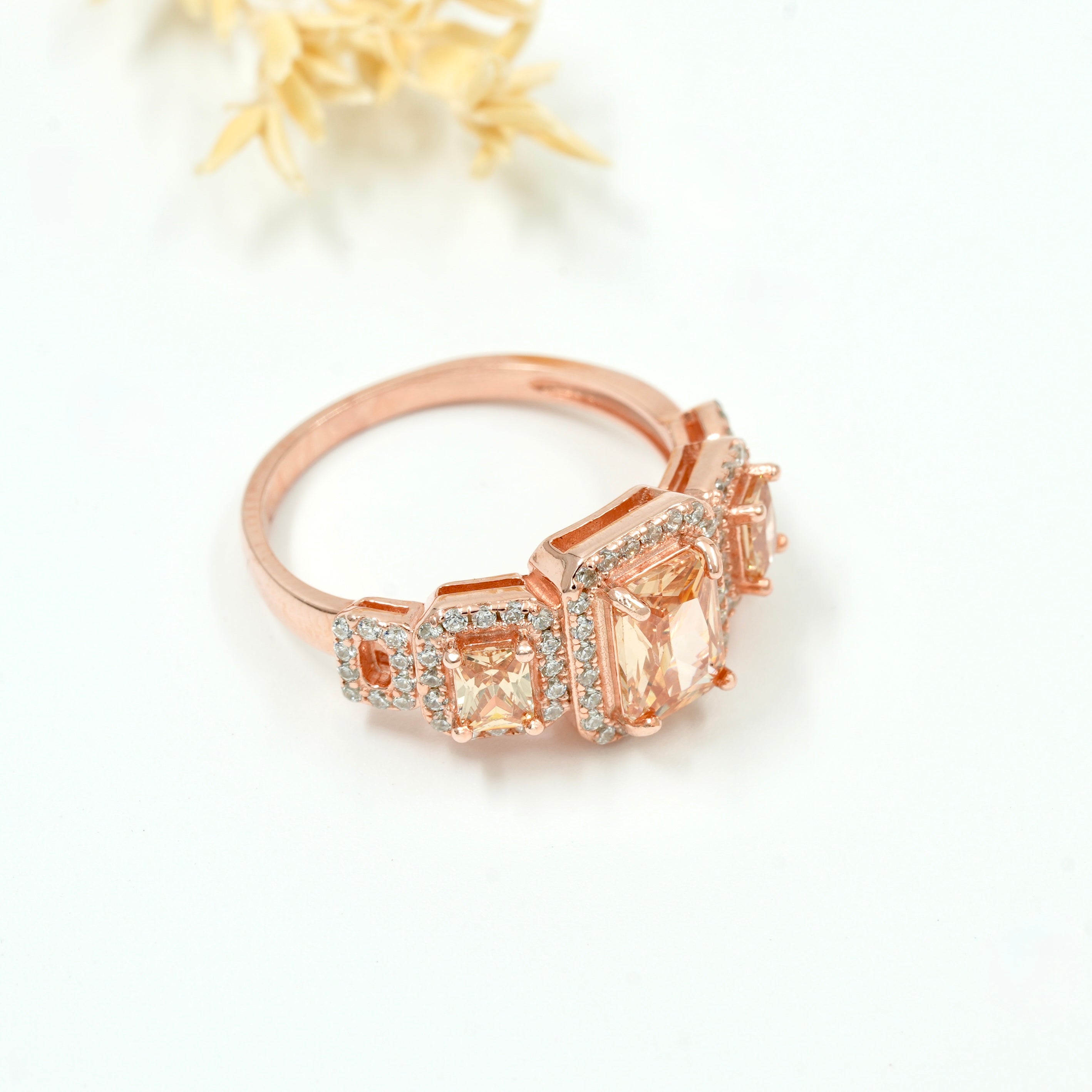 Rose Gold Plated 925 Silver Triple Stone Ring with American Diamond Halo – Available in Blue, Yellow & Peach