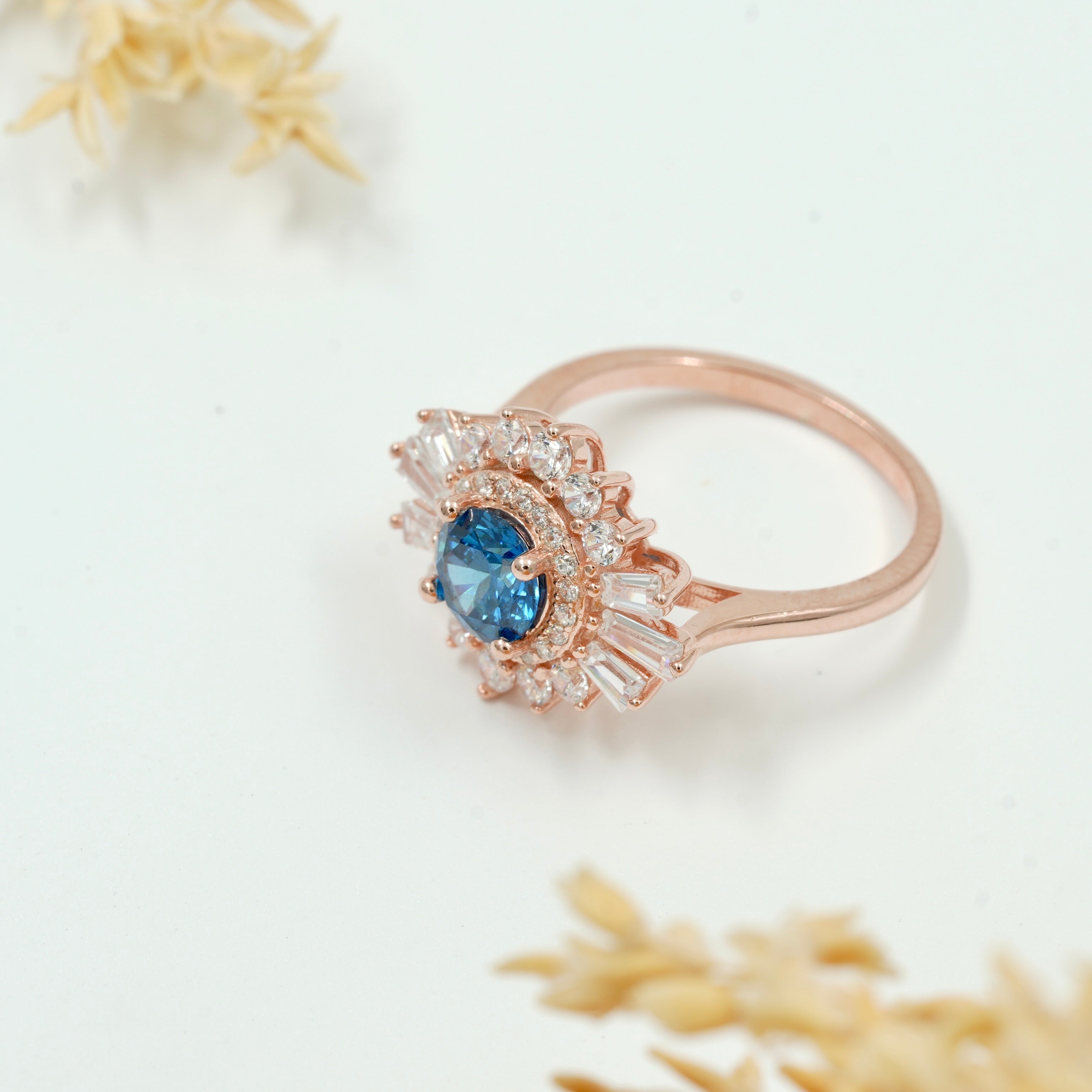 925 Silver Blue Sapphire Sunburst Halo Ring – Rose Gold Finish