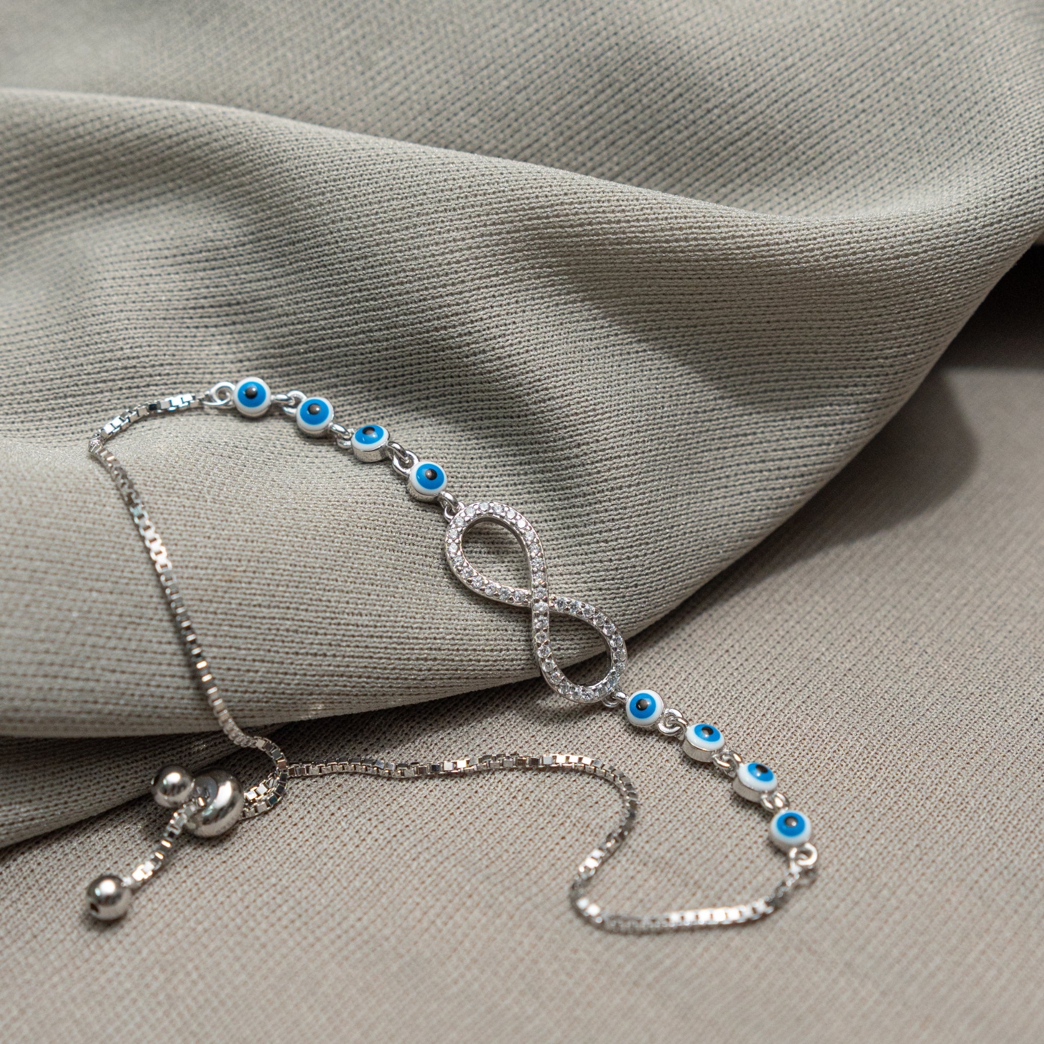 Infinity Evil Eye Slider Bracelet – Protection & Style For Her