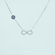 Close-up of 925 Silver Infinity & Evil Eye Pendant Necklace with Blue Evil Eye Charm
